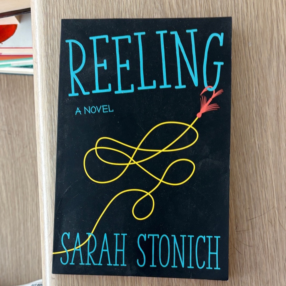 Reeling by Sarah Stonich - Black and Teal Novel paperback